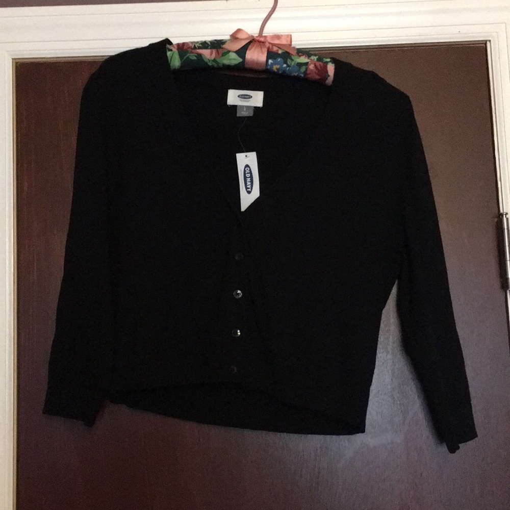 Cropped sleeve, waist length cardigan